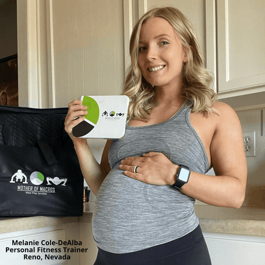 Pregnant personal fitness trainer holding meal prep container in Reno, Nevada, promoting healthy lifestyle.